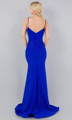 A woman faces away, wearing the Cinderella Couture 8084J Corset Beaded Prom Dress—a floor-length, royal blue gown with thin straps and a deep V-back.