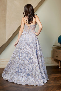 Amelia Couture 8098 lavender strapless floral prom dress with a floor-length silhouette, corset-style back, and textured jacquard pattern.