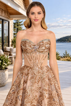 Amelia Couture 8098 strapless floral prom dress featuring a boned, sheer corset bodice embellished with rhinestones and gold floral embroidery.