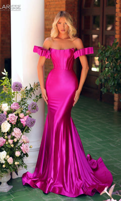 A woman in a fuchsia Long Prom Dress: Clarisse Designs 811160 stands indoors near a white column and a floral arrangement.