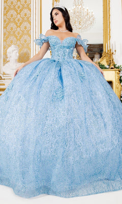 A woman poses in an ornate room wearing the Quinceanera Ball Gown 8120J, an off-the-shoulder sparkling light blue dress with delicate sleeves and a tiara.