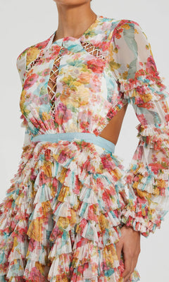 A person wearing the Midi Wedding Guest Dress: Mac Duggal 8130—a long-sleeve floral mesh midi dress with ruffle layers, lattice cutout details, and a fitted waist.