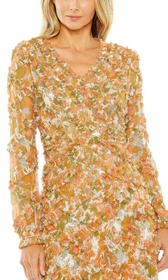 A woman wears the Mac Duggal 8134 Orange Print Wedding Guest Dress, a midi dress with long sleeves and textured fabric in warm yellow and white floral print—an elegant choice for any wedding guest.