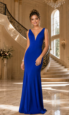 A woman wearing the Sleeveless V-Neck Long Formal Prom Dress 8158 in royal stands in an elegant marble foyer with a curved staircase and tall windows behind her.