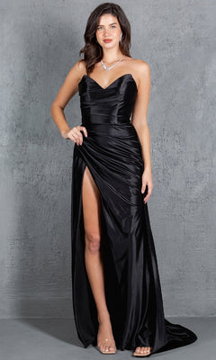 Woman wearing the Strapless Long Prom Dress: Cinderella Couture 8161J, featuring a black satin design with a sweetheart neckline and high slit, stands against a textured gray background.