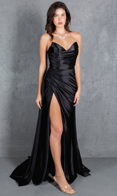 A woman models the Cinderella Couture 8161J strapless long prom dress featuring black satin, a sweetheart neckline, thigh-high slit, and clear heels against a gray textured backdrop.