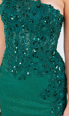 Close-up of a person in the Cinderella Couture 8162J: an emerald green one-shoulder prom gown with sequins and floral embroidery—an elegant formal dress under $200.
