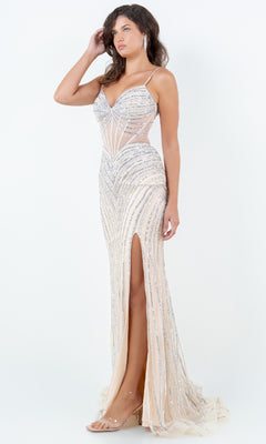 A woman wears the Cinderella Couture 8169J, a sleeveless, fitted floor-length nude pageant gown with silver sequin embellishments and a thigh-high slit, standing against a plain white background.