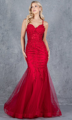 A woman stands against a gray textured background wearing the Cinderella Couture 8175J, a fitted red lace-up mermaid prom dress with thin straps, floral embellishments, and a tulle skirt.