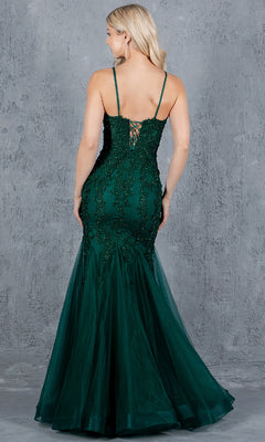 A woman wears the Cinderella Couture 8175J Lace-Up Long Prom Dress, a sleeveless emerald green gown with beaded lace applique, posing against a textured gray background.