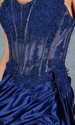 A close-up of the Cinderella Couture 8177J, a navy blue long corset prom dress with a beaded bodice, intricate floral embroidery, and a smooth satin skirt.