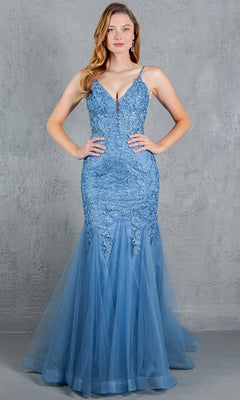 A woman stands against a gray textured background in the Beaded Long Prom Dress: Cinderella Couture 8178J—a fitted, floor-length, light blue mermaid gown with thin straps, a tulle skirt, lace detailing, and delicate beaded embroidery.