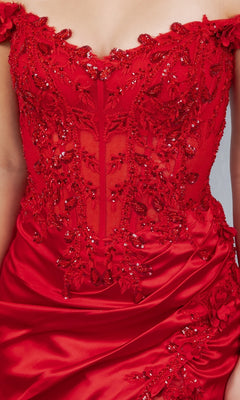 Close-up of a person wearing the Sexy Short Hoco Dress: Cinderella Couture 8181JS, featuring an off-the-shoulder red design with intricate beadwork, sequins, lace detailing, and a sheer corset-style bodice.