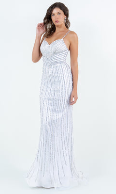 A woman models the Bead-Striped Prom Gown: Cinderella Couture 8203J, a floor-length fitted white dress with thin straps and vertical silver beaded stripes, against a plain white background.
