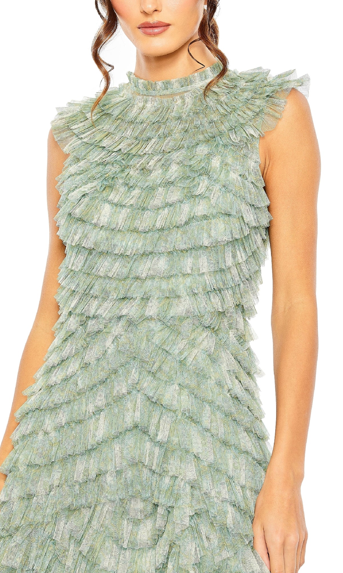 A woman stands against a white background wearing the sleeveless light green Mac Duggal 8225 Midi Ruffled Wedding Guest Dress, featuring layered ruffles.