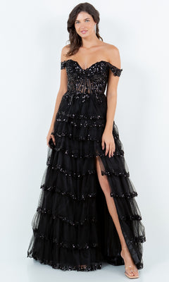 A woman poses against a plain white background in the Ruffle Prom Ball Gown: Cinderella Couture 8228J, featuring black off-the-shoulder tiered tulle, sequin embroidery, a thigh-high slit, and clear heels.