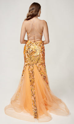 A woman faces away, wearing the Nina Canacci 8236 long formal dress—a sequin mermaid gown with floral patterns, crisscross back straps, and a sheer tulle train—perfect for any special occasion.