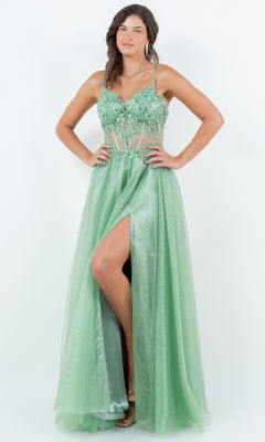 A woman wears the Long Glitter Prom Dress Cinderella Couture 8238J, an a-line evening gown in sparkly light green with a sheer bodice, sequin lace embroidery, floral appliqué, spaghetti straps, and a thigh-high slit.