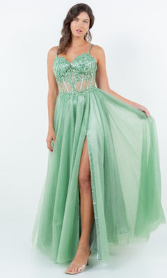 A woman models the Long Glitter Prom Dress Cinderella Couture 8238J, a sleeveless light green semi-sheer A-line gown with floral embellishments, sequin lace embroidery, and a high slit, against a plain white background.