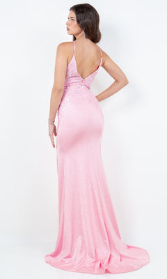 A woman models the Cinderella Couture 8255J, a long glitter prom dress with thin straps and a low back, standing against a plain white background.