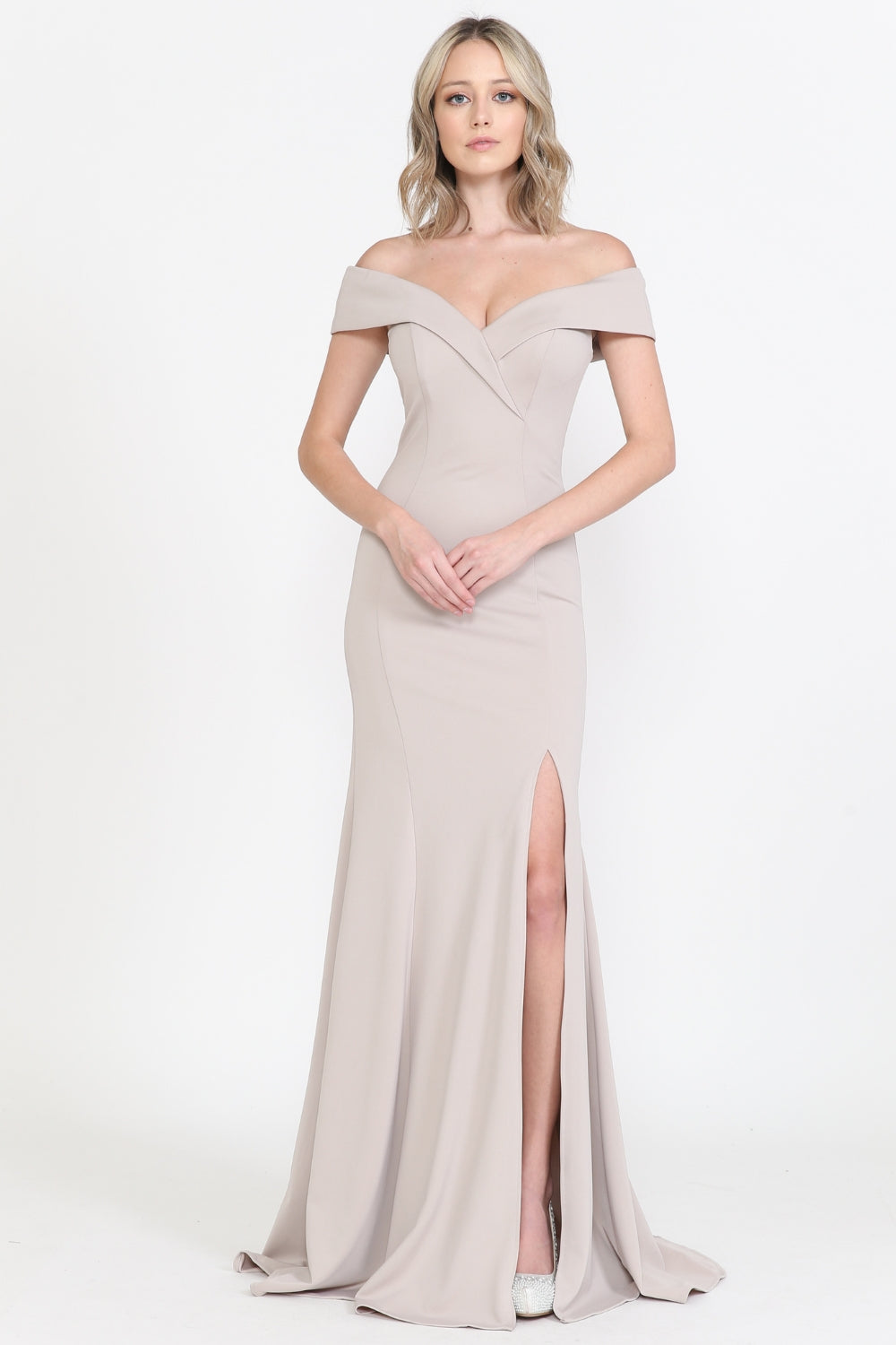 A woman models the Classic Off-the-Shoulder Formal Prom Dress 8258 in mocha, featuring a thigh-high slit, against a plain white background.