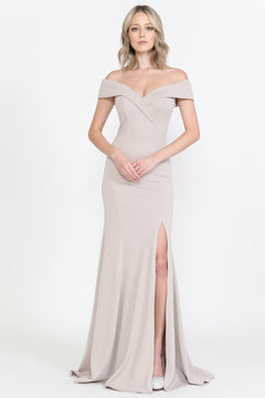 A woman models the Classic Off-the-Shoulder Formal Prom Dress 8258 in mocha, featuring a thigh-high slit, against a plain white background.