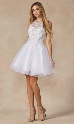 A woman wears the Juliet 826 short white homecoming dress featuring a sleeveless lace bodice and A-line tulle skirt, paired with silver high-heeled sandals against a neutral background.