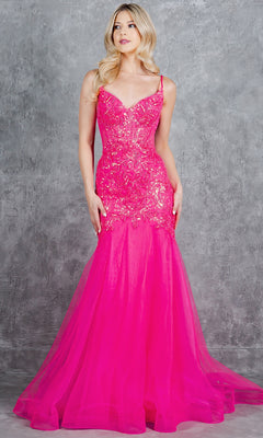 A woman poses against a gray textured background in the Cinderella Couture 8276J—a bright pink, floor-length mermaid prom dress with sequins, embellishments, and a flared tulle skirt.