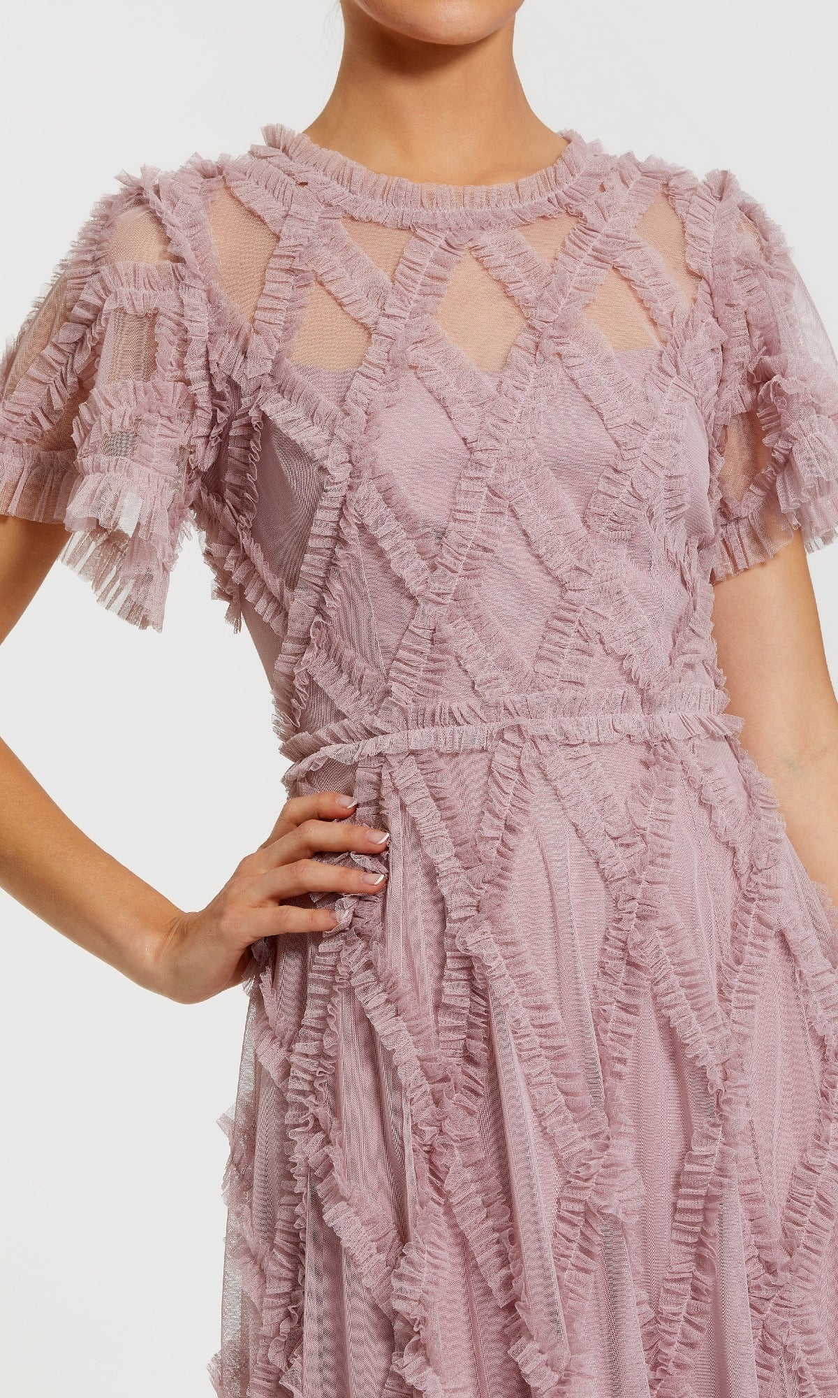 Pink ruffled dress with a white background