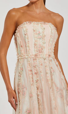 A woman wearing the Mac Duggal 8308 Strapless Print Midi Party Dress.