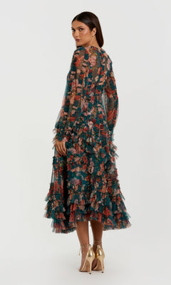 Woman wearing the Mac Duggal 8348 Floral Wedding Guest Dress with long sleeves, A-line skirt, and ruffled tiers, looking over her shoulder and paired with metallic high-heeled shoes.