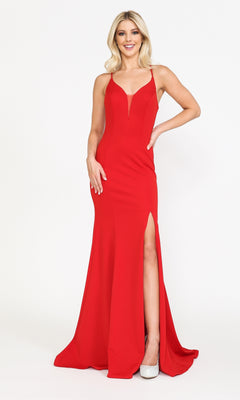 A woman wears the Open-Back V-Neck Long Simple Jersey Prom Dress 8360 in red, featuring spaghetti straps and a thigh-high slit, while smiling against a plain white background.
