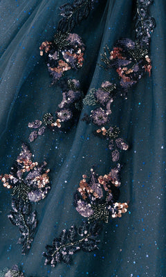 Close-up of the Quinceanera Dress 8440JQ by Cinderella Couture in dark teal with glitter, detailed with intricate floral embroidery and sequins in pink, purple, and gold tones.
