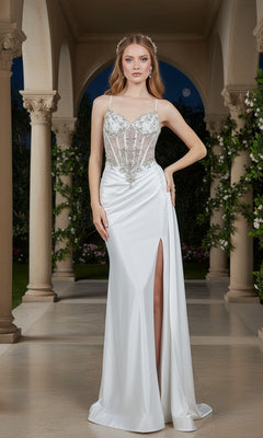 A woman poses in a stone archway wearing the Cinderella Couture 8483J long prom dress in off white, featuring a sheer corset bodice, beaded embroidery, and an elegant thigh-high slit.