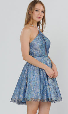 A woman in the Glitter-Mesh Short A-Line Homecoming Dress 8506, sleeveless with a flared skirt in navy/blue, stands against a plain light background, facing slightly to the side.