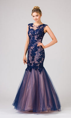 A woman poses against a light background wearing the Eureka 8510 long prom dress in Navy/Blush, featuring a sleeveless lace bodice, open back, and sheer tulle mermaid skirt.