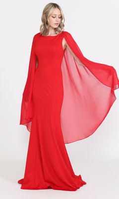 A woman models the High-Neck Simple Long Jersey Prom Dress 8566 in red, featuring a fitted floor-length design and sheer flowing cape sleeves, standing against a plain white background.