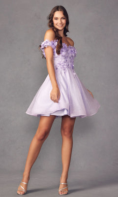 A woman models the Floral Off-the-Shoulder Short Homecoming Dress 861 with 3-D flowers and strappy heels, posing against a plain gray background.