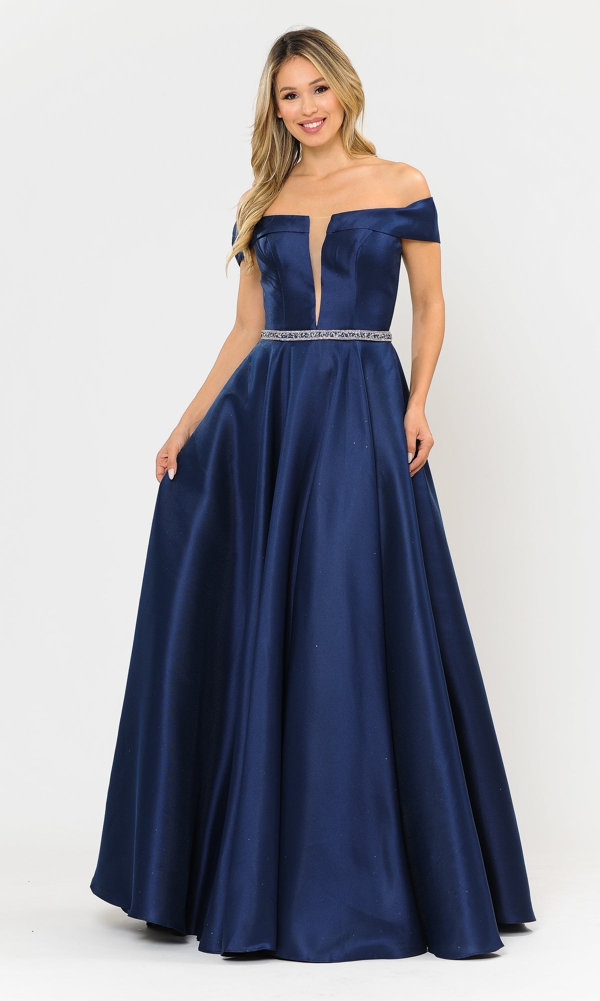 A woman models the Plunging V-Neck Long Mikado Prom Ball Gown 8680 in navy, featuring an off-the-shoulder design, deep V-neckline, silver belt, and floor-length silhouette against a plain background.