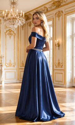 A woman in the Plunging V-Neck Long Mikado Prom Ball Gown 8680 stands in an ornate, gold-trimmed room with wooden floors and chandeliers, looking over her shoulder.