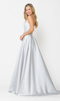 A woman with long blonde hair wears the Scoop-Neck Long A-Line Prom Dress with Pockets 8684, standing and smiling against a plain white background.