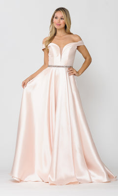 A woman models the Off-the-Shoulder Long Prom Gown with Pockets 8686, a light pink, fitted-waist evening dress featuring a deep V neckline and full skirt, standing against a plain white background.