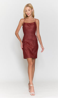 A woman wears the Short Glitter Simple Homecoming Dress 8728, a sleeveless red knee-length dress with thin straps, paired with white high-heeled sandals, standing against a plain white background.