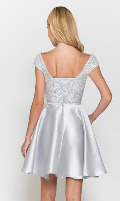A woman is shown from the back wearing the Cap-Sleeve Short A-Line Homecoming Dress 8732, a silver sequin party dress with a fitted bodice, cap sleeves, and a satin flared skirt.