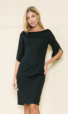 Woman wearing the Semi-formal Short Career Dress with Sleeves 8772 in black, featuring a fitted silhouette and three-quarter sleeves—a classic, polished choice for work.