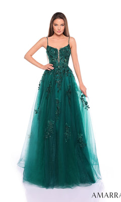 A woman in the Amarra 88086 sleeveless deep green long formal dress, featuring floral embellishments, a sheer corset bodice, and a flowing tulle skirt, stands against a white background.