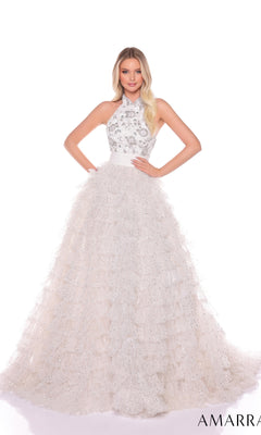 A woman stands wearing the Amarra Long Formal Dress 88102, featuring a sleeveless halter neck, fitted beaded bodice, and a ruffle layered skirt with sparkling details.