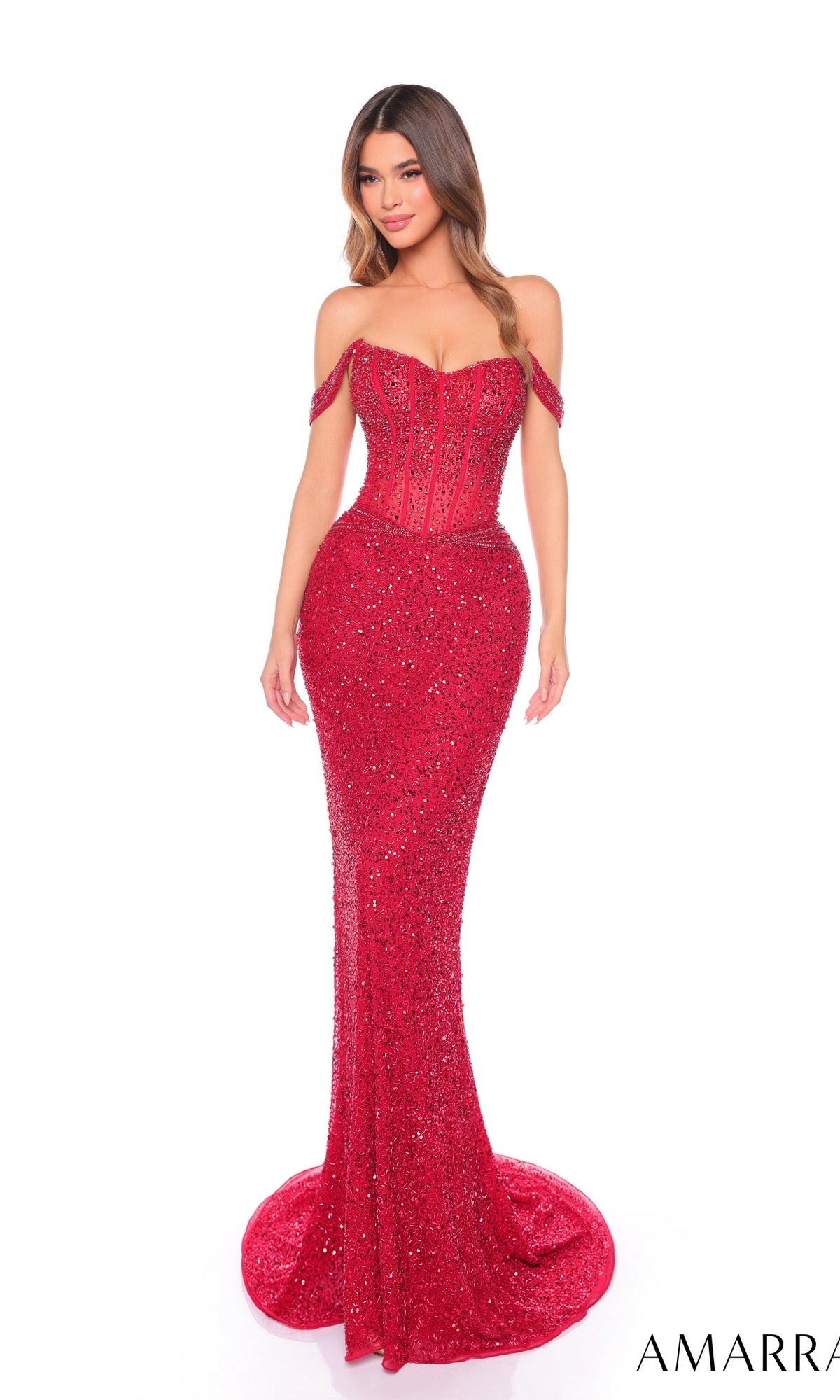A woman models the Long Formal Dress 88108 by Amarra—an elegant, fitted off-the-shoulder red gown with a corset bodice and sparkling embellishments—against a white background.