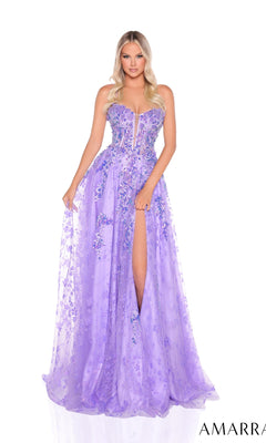A woman stands against a white background wearing the Amarra 88315: a strapless, lavender A-line prom dress with 3D floral appliques, sheer details, and a thigh-high slit.