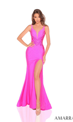 A woman poses in the Amarra 88316 Long Prom Dress, a fitted, bright pink bodycon gown with a deep V-neckline, high slit, hot stone embellishments, and a lace-up back. The background is plain white.